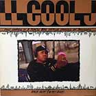 L.L. COOL J : PINK COOKIES IN A PLASTIC BAG GETTING CRUSHED BY BUILDINGS
